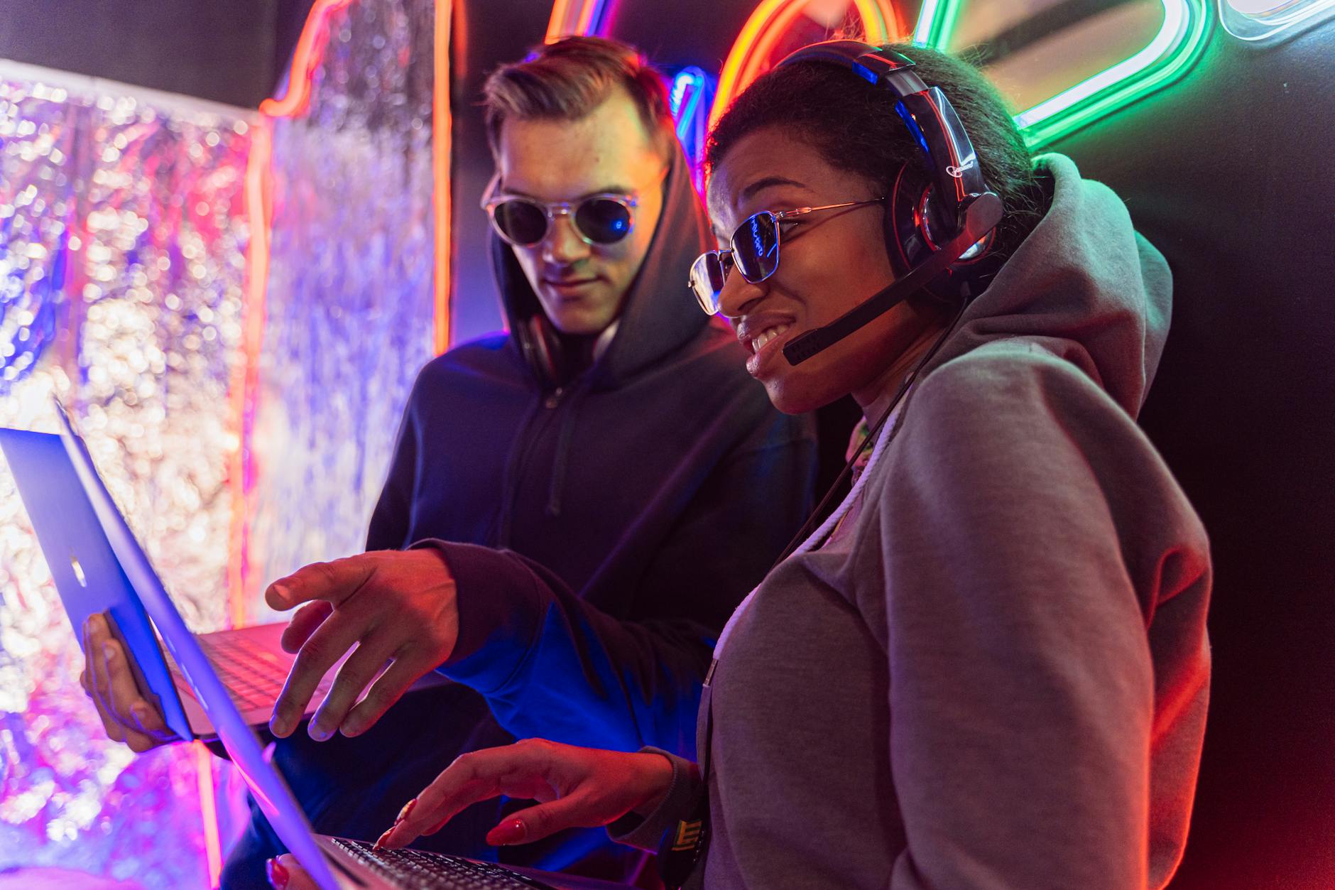 woman in gray hoodie wearing black sunglasses